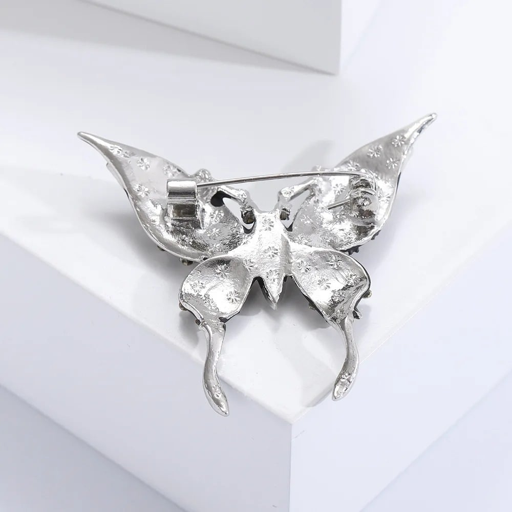 Leona brooch, black, with silver setting, in the shape of a butterfly