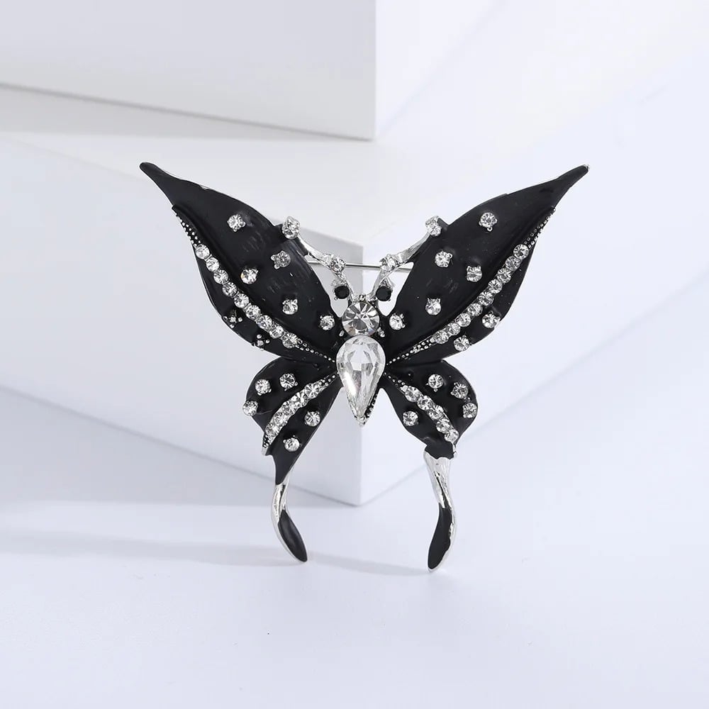 Leona brooch, black, with silver setting, in the shape of a butterfly